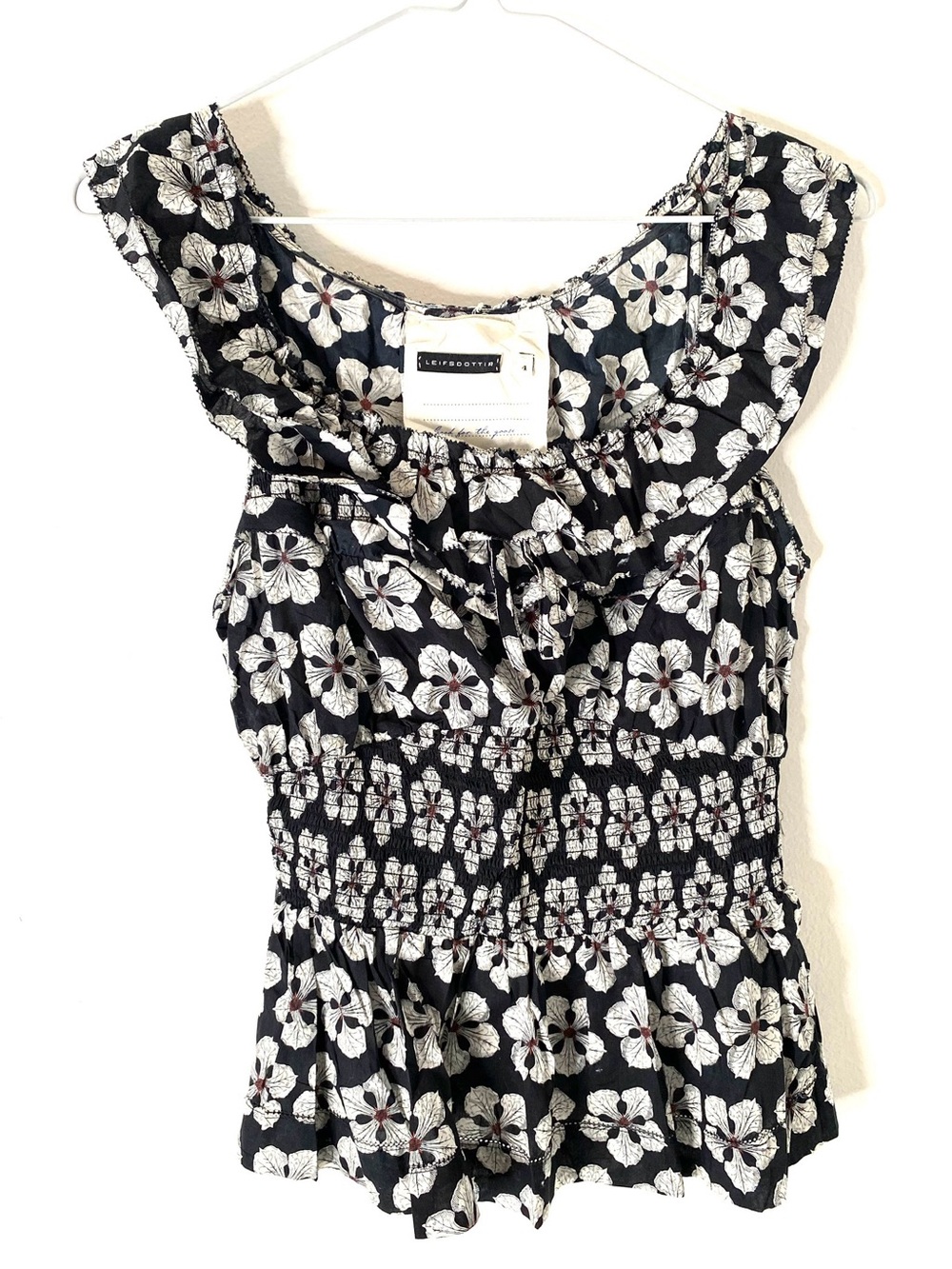 Leifsdottir Anthropologie Black Floral Smocked Waist Ruffle Cotton Top